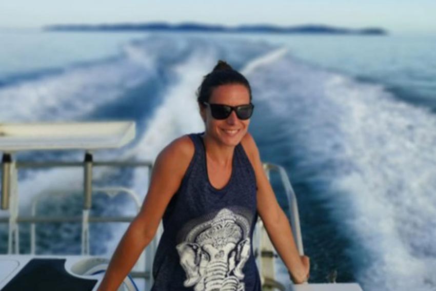 AUT marine geologist Dr Marta Ribó on a boat in the ocean.