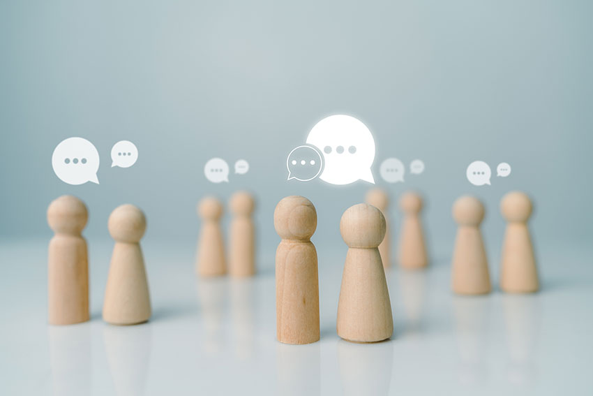 Conversation exchange of ideas in an organization or in society, joining a group listening to discussions sharing creative experiences the face-to-face communicate talking and meeting with strangers.