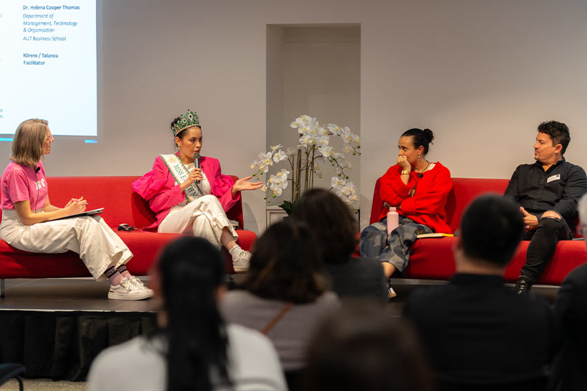 The panel discussing throughout the event